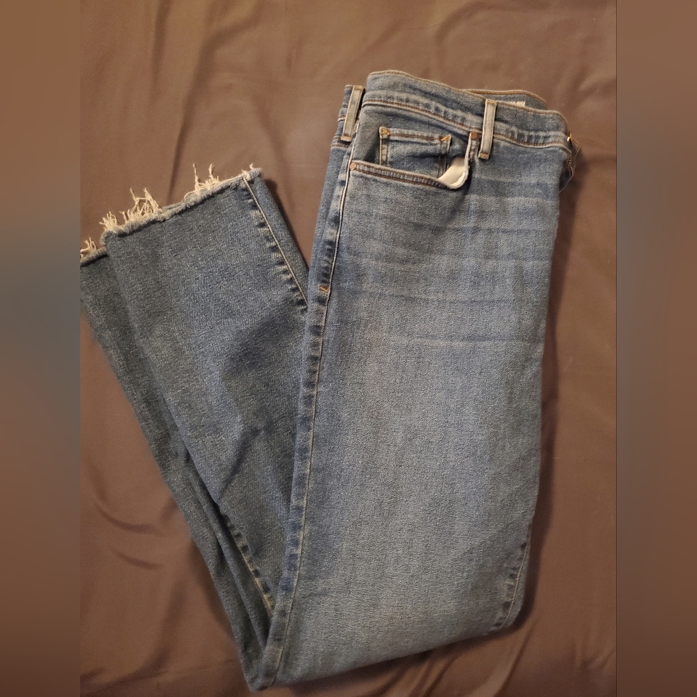 a.n.a Size 16 Women's Distressed Blue Jeans. Frayed at the bottoms